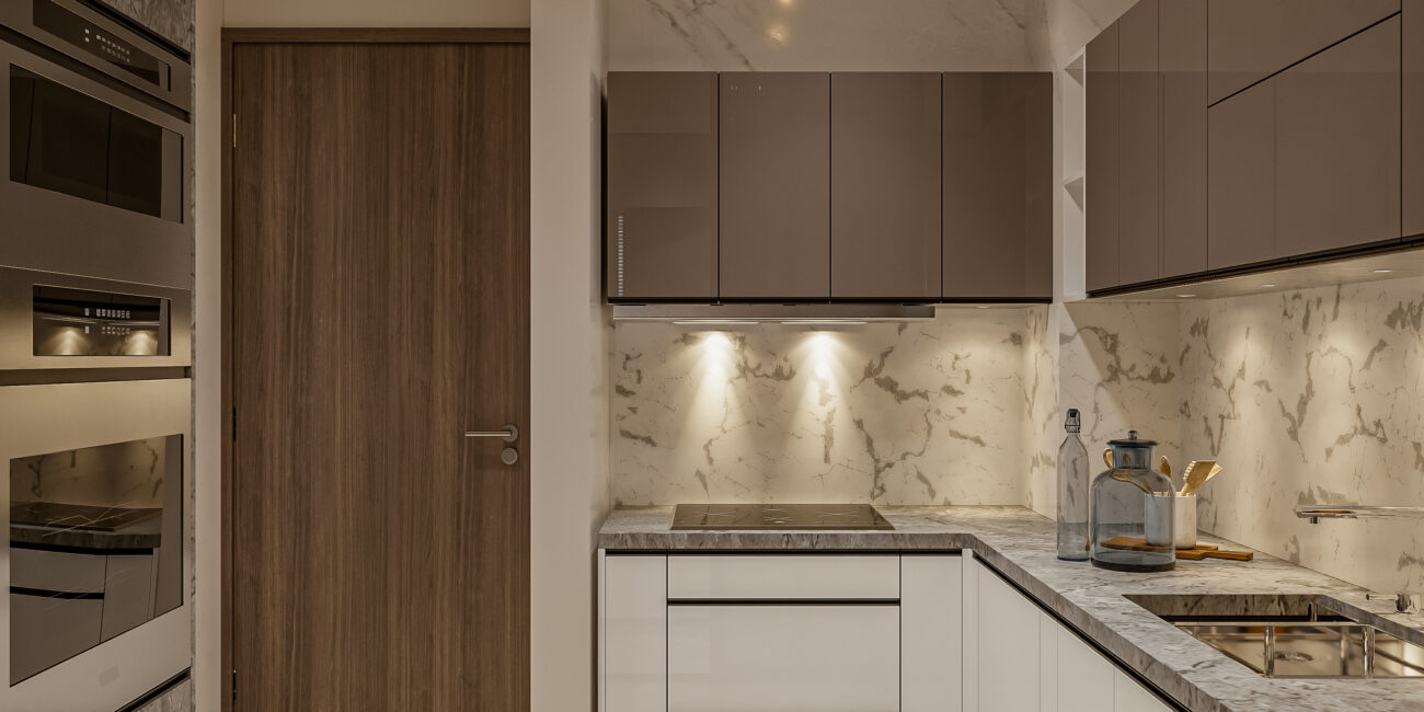 A minimalist kitchen design with sleek, handle-less cabinets.