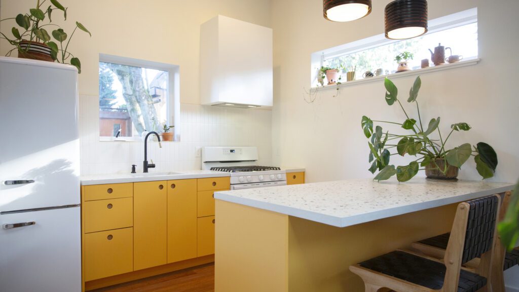 Modern kitchen with yellow cabinets