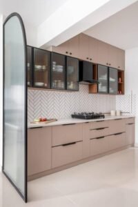 Blush Pink Modular Kitchen with Black Framed Glass