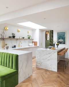 Contemporary Peninsula Kitchen with Statement Lighting