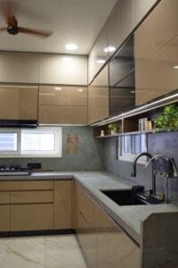 Glossy Beige and Grey Kitchen with Stone Counter