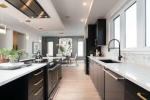 Luxury black double galley kitchen with gold accents.