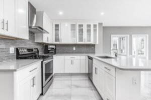 Modern Grey U-Shaped Kitchen with Tile Backsplash