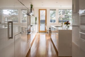 Rustic wooden double galley kitchen with vintage-style cabinetry.
